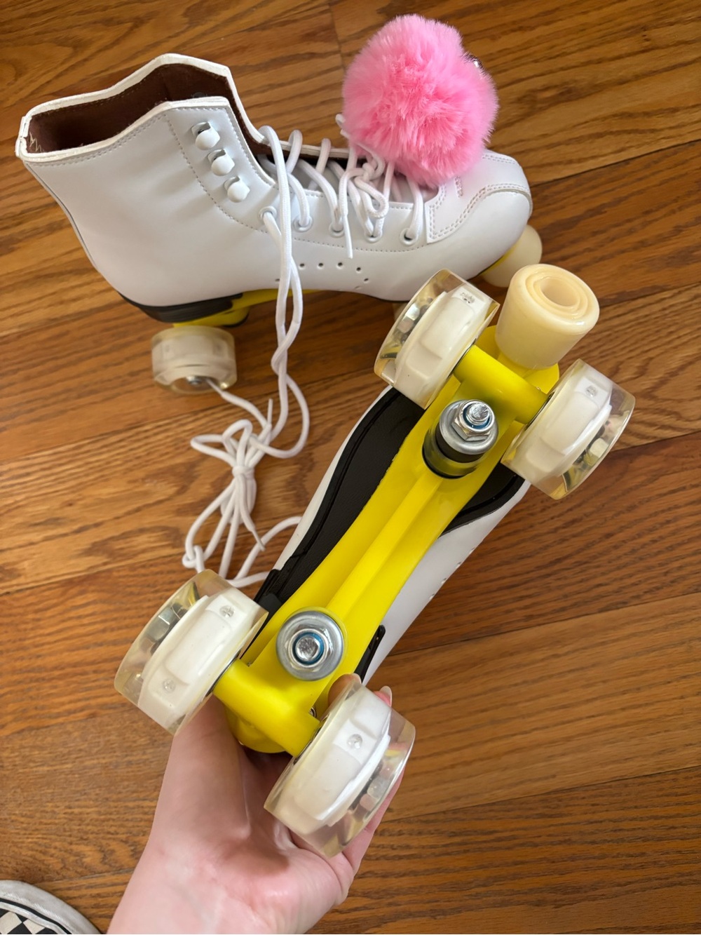 White Roller Skates with Pink Pom Accent